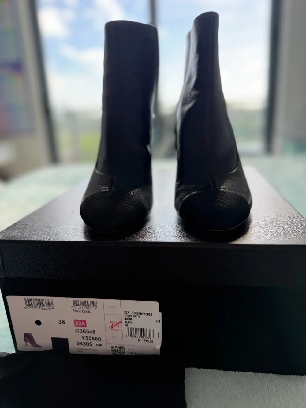 CHANEL Black Leather Ankle Booties with Black Cap Toe and Gold CC